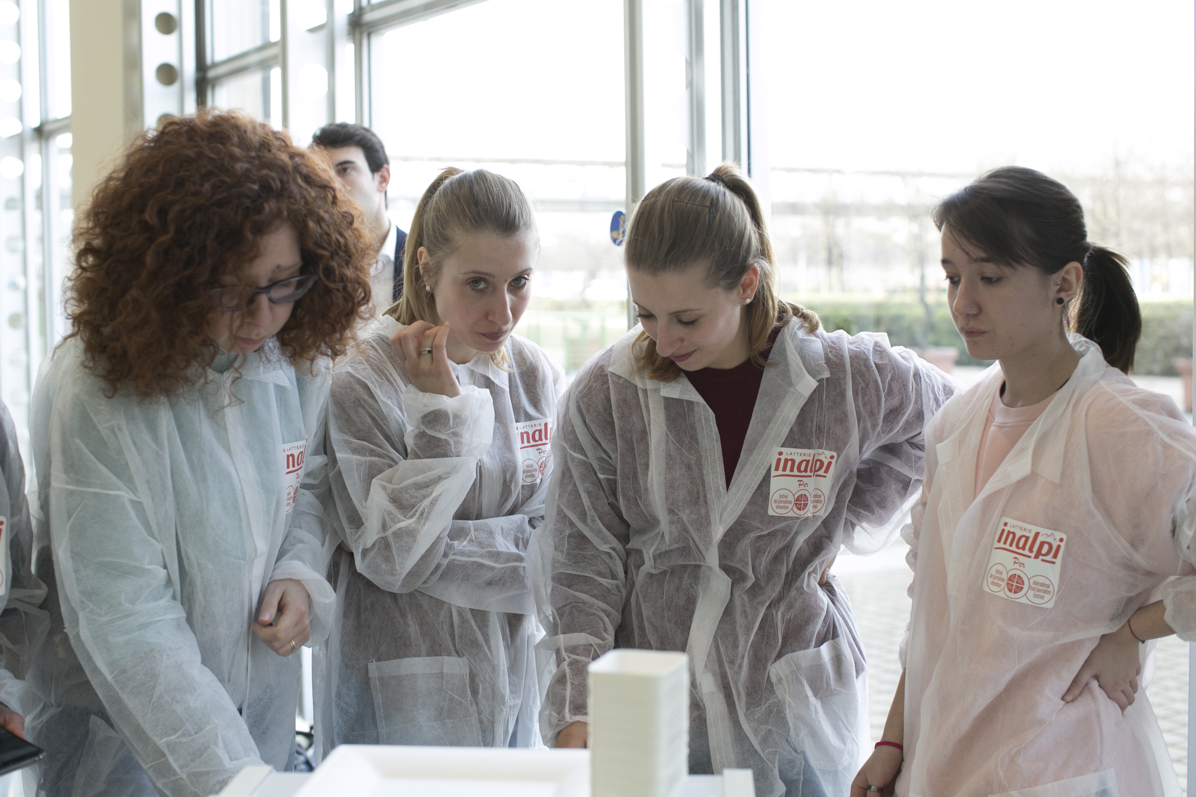 the lab coats for the festival workshops offered by Inalpi